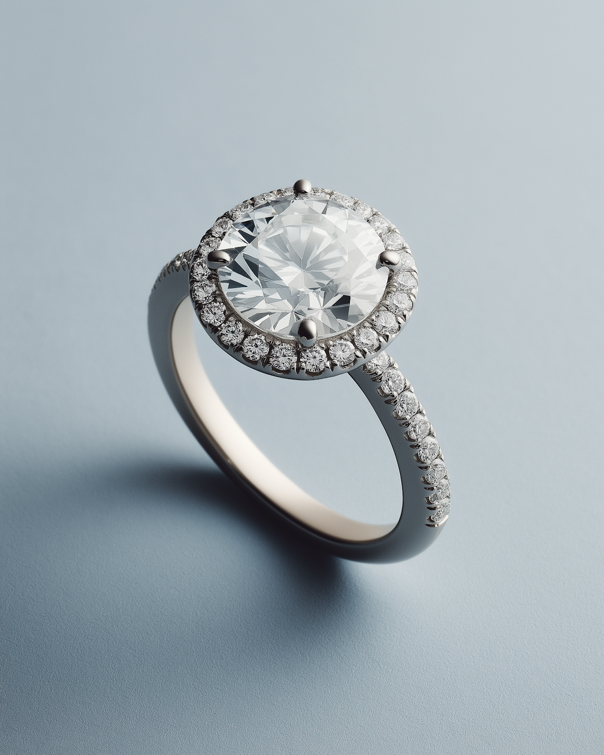 Diamond ring with a halo of smaller diamonds
